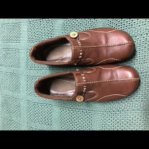 Clark’s brown shoes